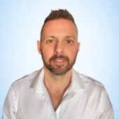 Hurst Derrick Default Blue Headshot